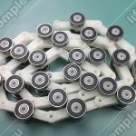 Отклоняющая цепь торца балюстрады, THYSSEN Velino, 22 звена, L - 1260, пластиковая